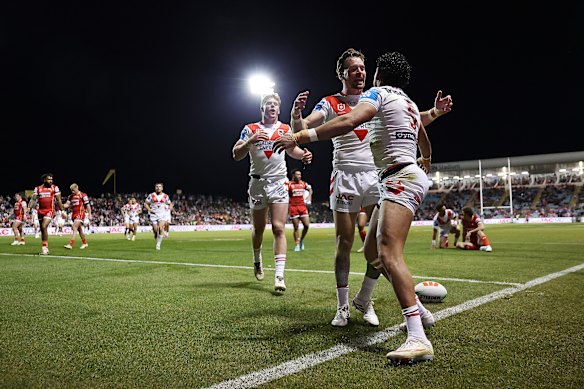 The Dragons celebrate Tyrell Sloan’s try.