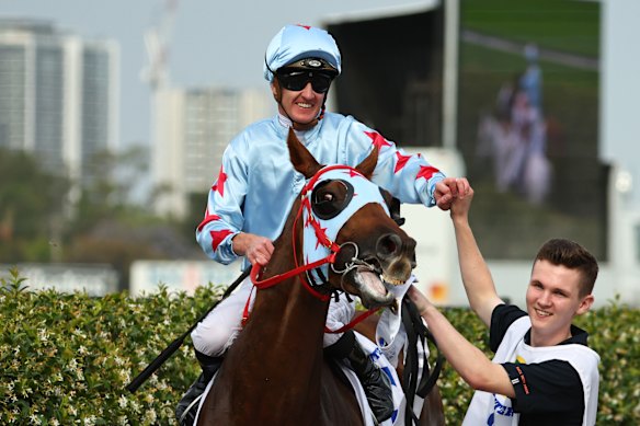 Jockey Chad Schofield and Brave Pride celebrate Coal Crusher’s Hunter win.