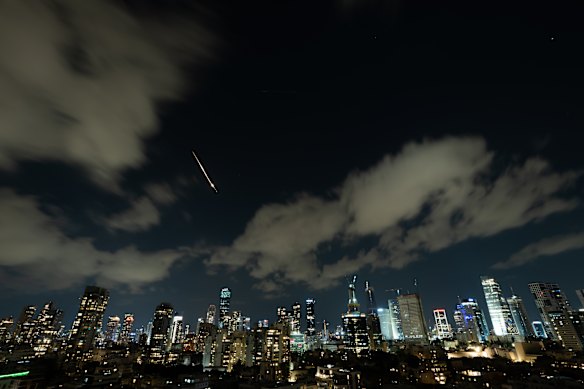 A projectile streaks over the Tel Aviv skyline earlier this month. Iran has continued to launch missiles and drones at Israel in response to the joint US-Israeli attacks.
