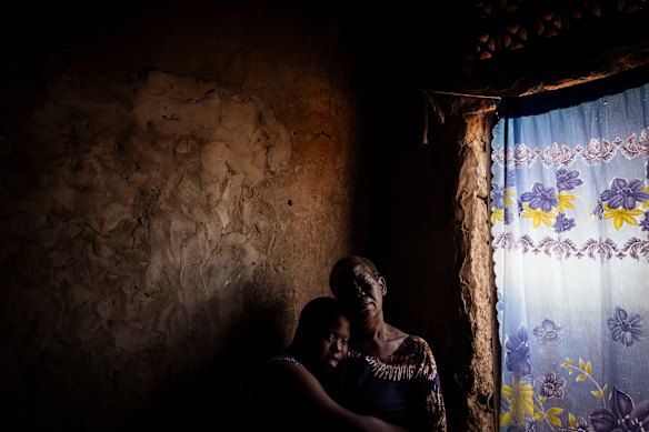 Ketty embraces her emotional mother Rose Akiro. Ketty returned to boarding school the day after this photo was taken.