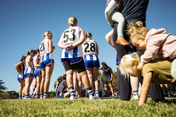 Thornton Eildon Football Club players listen to the pre-game address by coach Tash Hay. The Thornton Shinboners are the only all-female club in Victoria.