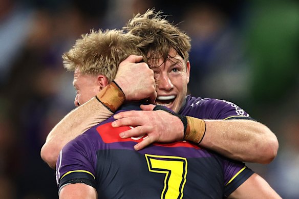 Tyran Wishart and Harry Grant celebrate their preliminary final win over the Sharks.