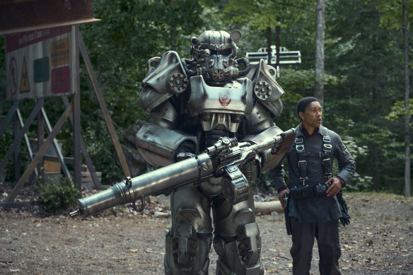 Aaron Moten and one of the Power Suits who star in the TV adaptation of video game <i>Fallout</i>.