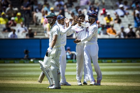 Jasprit Bumrah celebrates Travis Head’s wickets at the MCG four years ago.