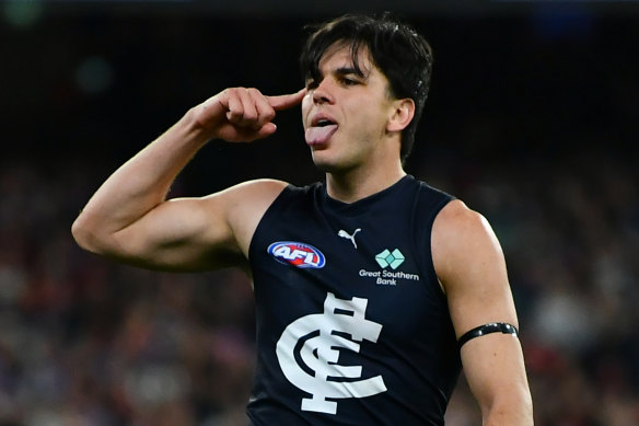 Elijah Hollands celebrate a goal.