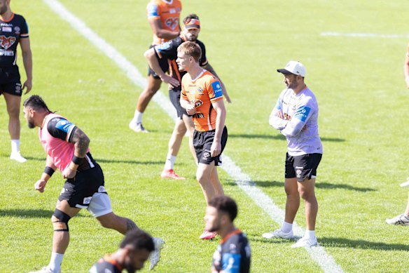 Lachie Galvin prepares for a drill in front of coach Benji Marshall