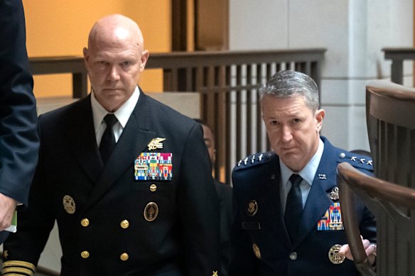 US Navy Admiral Frank “Mitch” Bradley, left, and Joint Chiefs of Staff chairman General Dan Caine arrive at Capitol Hill to meet with lawmakers on Thursday.