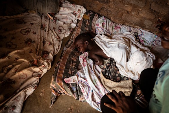 Fred Alimet finds an upset 3-year-old Fleix's ankle tied to a nail in the wall via twine. Felix is often tied when his mother Jennifer Asuku is out doing chores. She says it is for his own safety as he could roll over and knock the cooking stove and fire and burn himself. Felix lives with Cerebral Palsy and Jennifer has been ostracised by her family and Felix's father. 