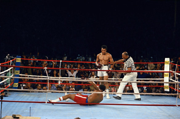 Ali drops Foreman at the end of the eighth round to win back the heavyweight championship of the world.
