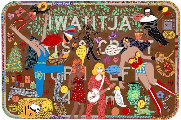 Seven Sisters Song, painted on a road sign, is one of 200 Indigenous Australian artworks on display at the National Gallery of Art.