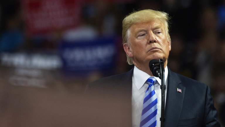 President Donald Trump takes the stage at a rally in West Virginia on Tuesday.