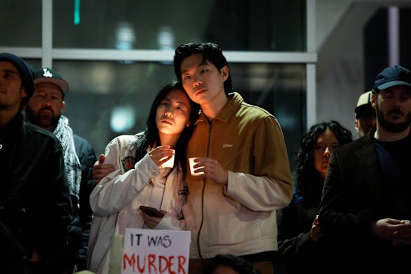 Candlelit vigils were held for Alex Pretti on Saturday night, hours after he was killed.