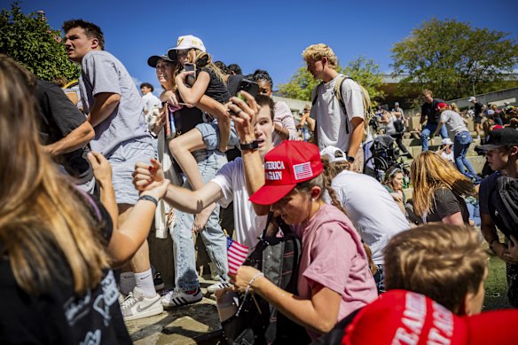 The crowd reacts after Charlie Kirk, the CEO and co-founder of the conservative youth organisation Turning Point USA, is shot at the Utah Valley University.