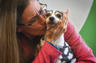 Katheryn Strang is reunited with her fox terrier, Dutchess.