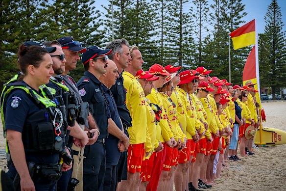 Altona Life Saving Club lifesavers stood with emergency service officers to pay tribute to the Bondi victims.