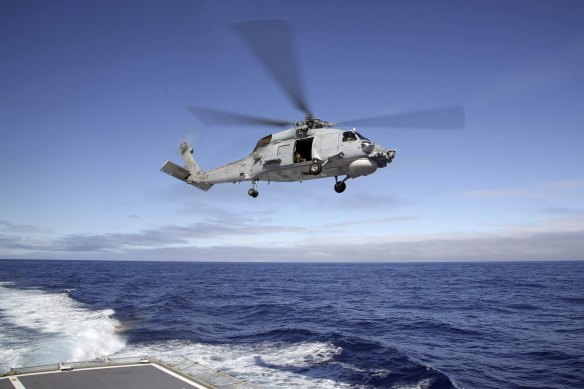 An Australian Navy Seahawk chopper  had a adjacent   miss   with a Chinese combatant  jet.