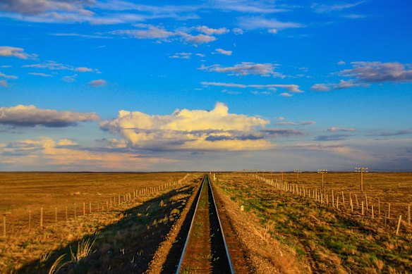 A country, vast and desolate, unfolds along the Trans-Mongolian Railway.