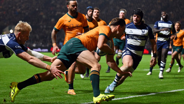Lachlan Anderson of Australia scores for the Australia XV against Bristol.