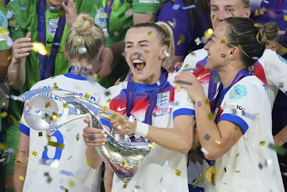 England's Chloe Kelly celebrates with the trophy after winning the Women's Euro 2025.