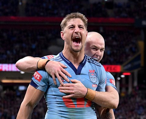 Zac Lomax celebrates a NSW try.