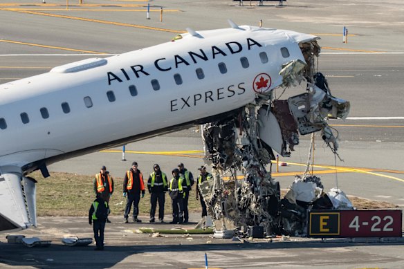 The front section of the CRJ-900 aircraft was destroyed in the 200 km/h collision.