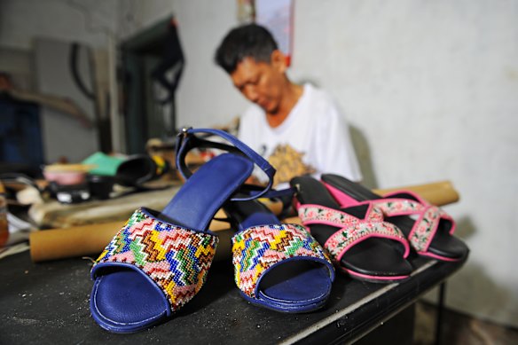 Making beaded shoes in Melaka.