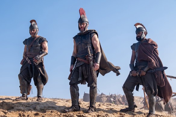From left, Jimmy Gonzales ia Cepheus, Matt Damon as Odysseus and Himesh Patel as Eurylochus in a scene from The Odyssey.