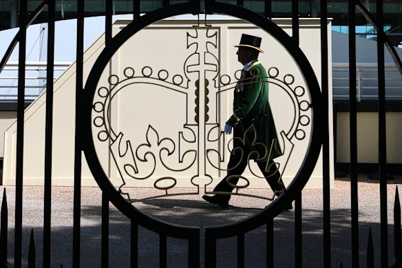 Racegoers arrive on the first day of the Royal Ascot horse race meeting in Ascot, England.