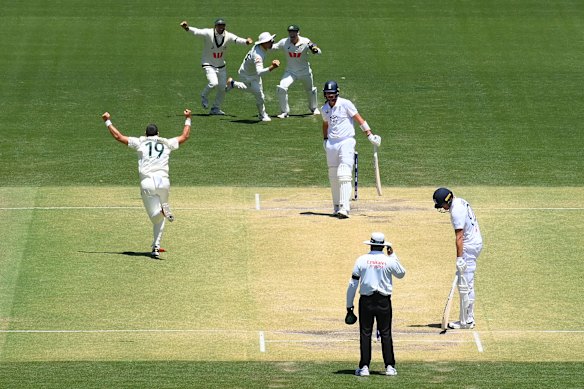 Scott Boland and Australia celebrate taking the final wicket in Adelaide to retain the Ashes.