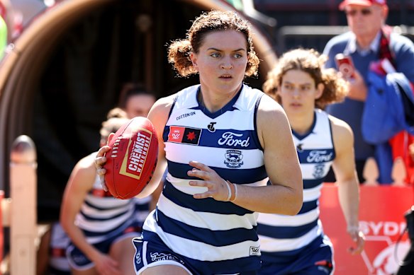 Cats skipper Meg McDonald, pictured leading her side out in a match against the Swans earlier this month.