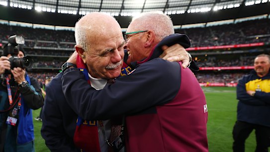 Chris Fagan (right) arm-in-arm with fellow triple-premiership Lions coach, and great mate, Leigh Matthews.