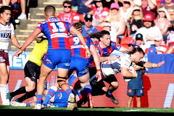 Josh Feledy goes over for one of his three tries.