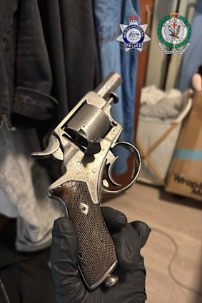 A revolver was seized during the raids.