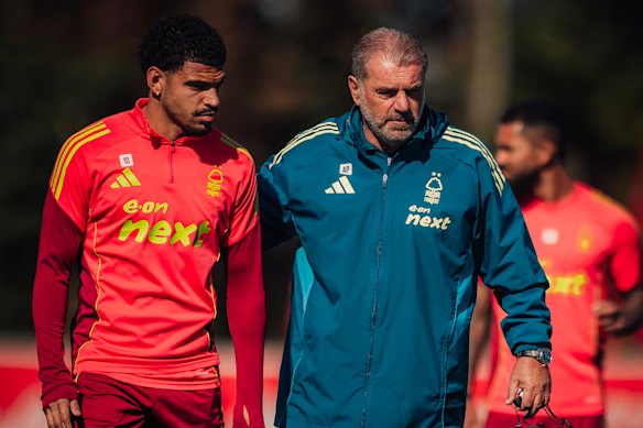 Ange Postecoglou with Morgan Gibbs-White.