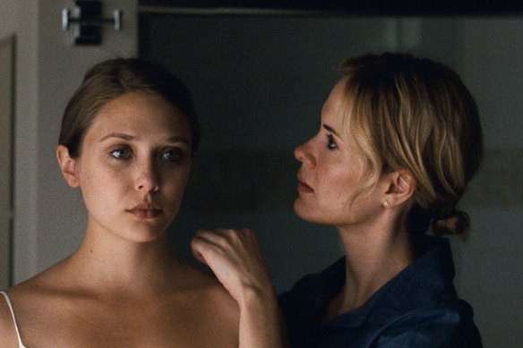 Elizabeth Olsen (left) with Sarah Paulson in Martha Marcy May Marlene.