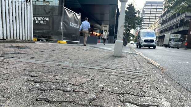 The cracked and uneven footpath at 160 Ann Street.