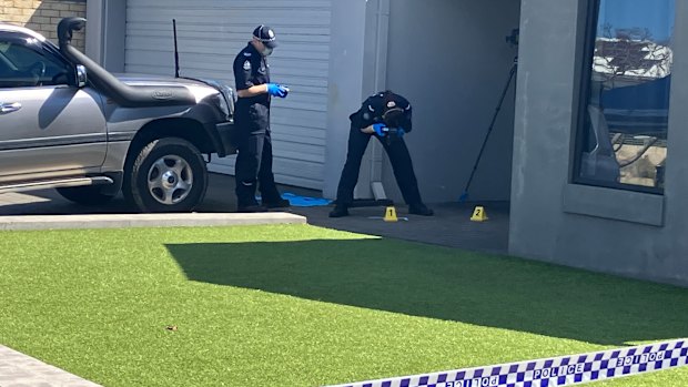Forensics officers at a property on Bramall Terrace, Baldivis.