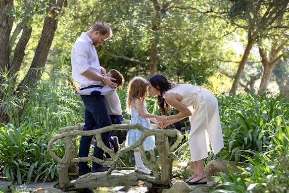 Harry and Meghan with Prince Archie and Princess Lilibet in December.