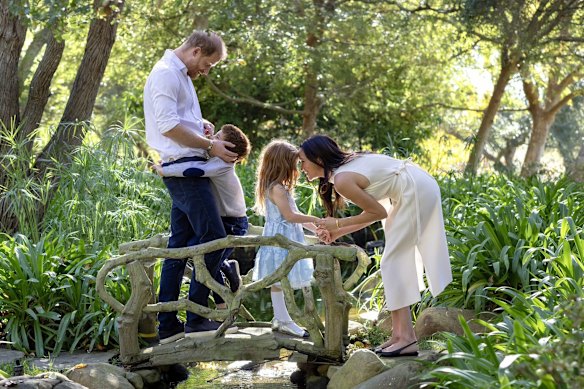 Harry and Meghan with Prince Archie and Princess Lilibet in December.