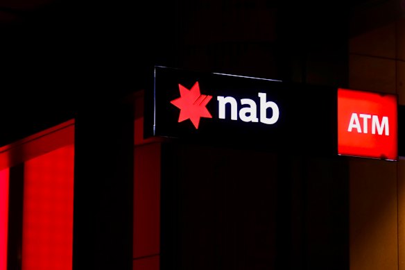NAB reported a slight decline in cash profits as bad debt charges edged higher.
