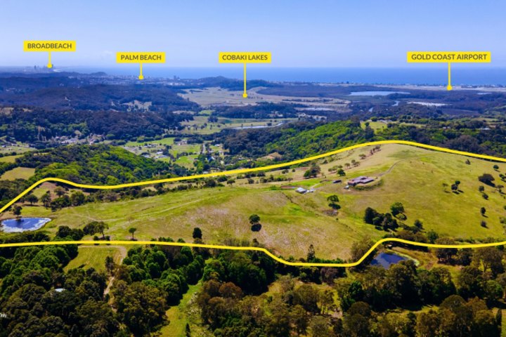 The 62-hectare farming property rezoned for residential development at 147 McAllister Road, Bilambil Heights in northern NSW is being offered for sale with a price guide of $182 million. 