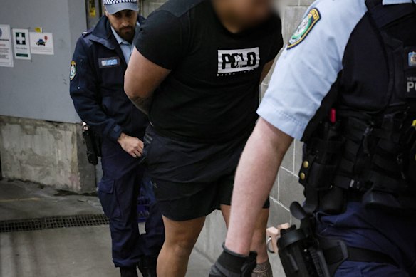 A man is taken into custody in relation to the investigation into the fatal drive-by shooting.