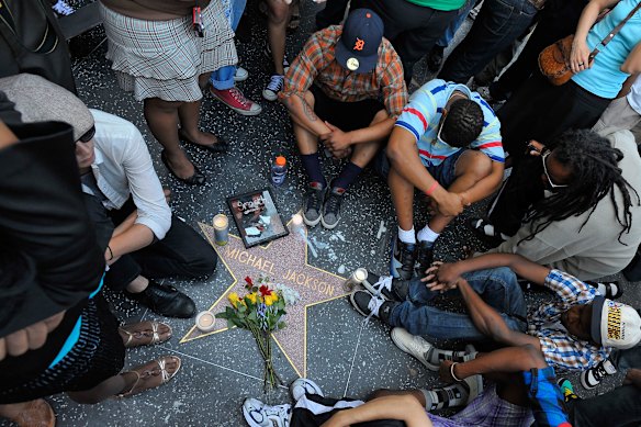 Fans gather at Jackson’s star on the Hollywood Walk of Fame after his death in June 2009.