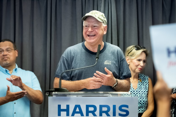 Tim Walz in his now trademark camouflage cap.