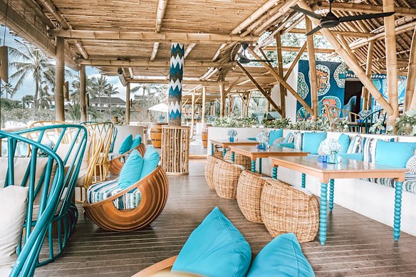 Azul Beach Club serves charcoal-baked lobster with a side of reggae.