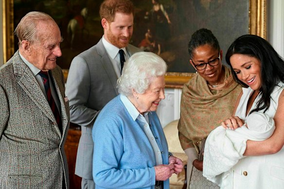 Harry and Meghan – with her mother Doria Ragland – show their newborn son to Queen Elizabeth II and Prince Philip at Windsor Castle in 2019.