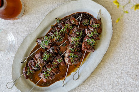 The black vinegar sauce on these Sichuan-style cumin and lamb skewers also serves as a glaze.