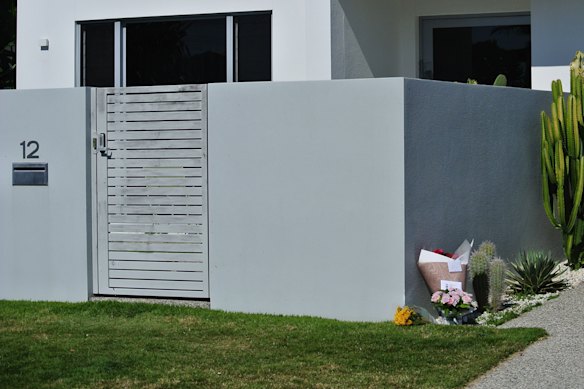 Flowers placed outside the home of Zdravko Bilic, where he was found dead on Monday.