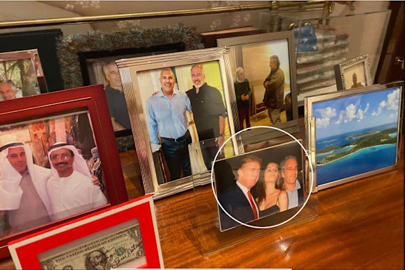 Epstein kept a photo of himself socialising with Trump on his desk. 