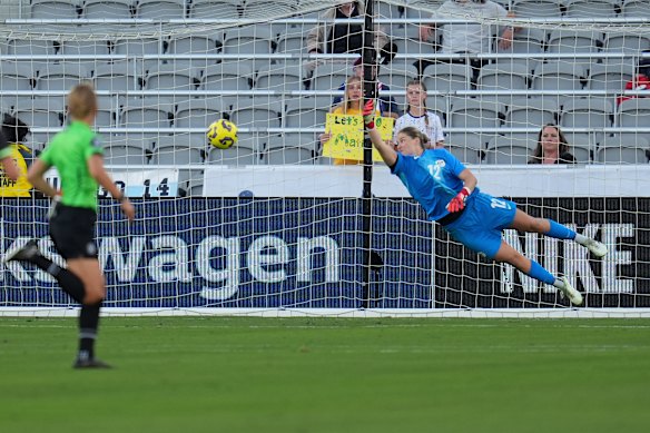 Wendy Bonilla shoots the ball straight past Teagan Micah to score for Colombia.